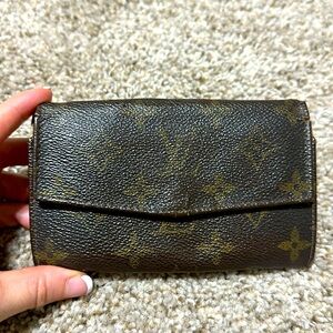 authentic used and worn LV mono compact wallet.